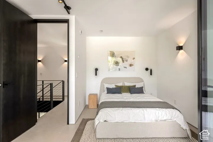 White walls with integrated sconce lighting