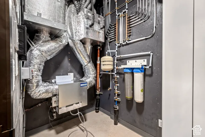 HVAC system with extensive ductwork, water filtration system, and integrated manifold piping