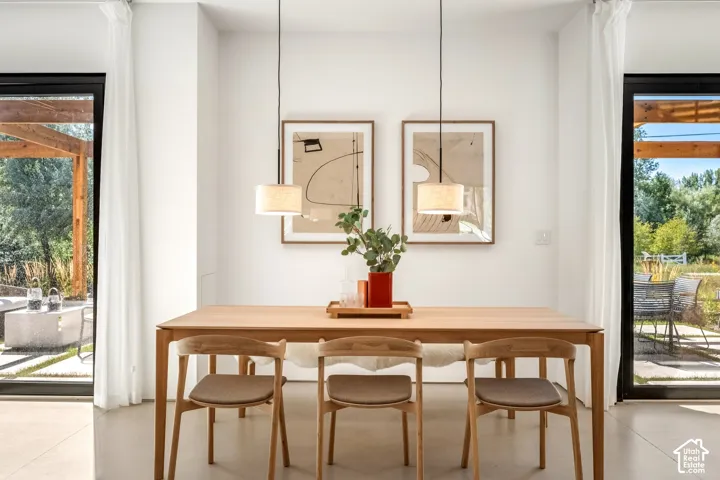 Light-filled interior space with two pendant light fixtures