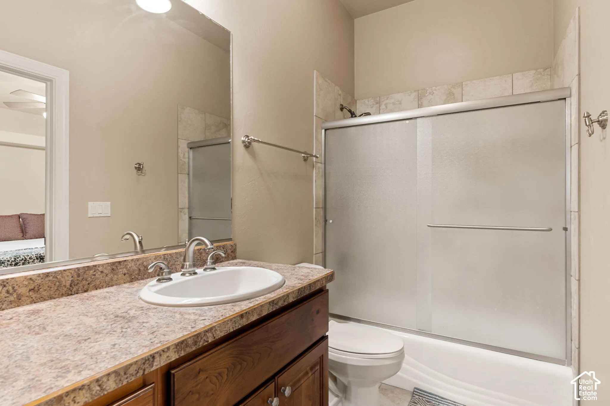 Bathroom vanity with a composite countertop and integrated sink
