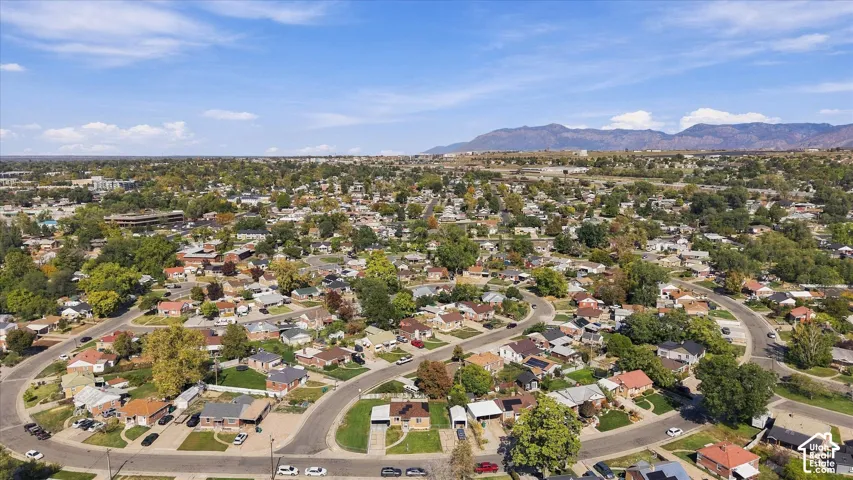 Expansive residential area with curvilinear streets and mature landscaping