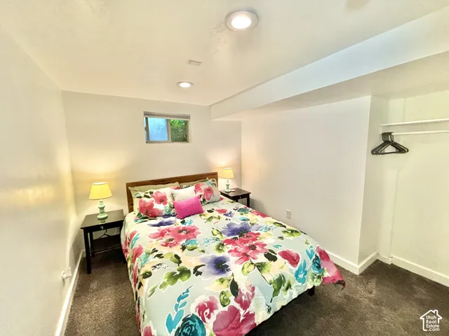Recessed lighting, window, and wall-to-wall carpeting