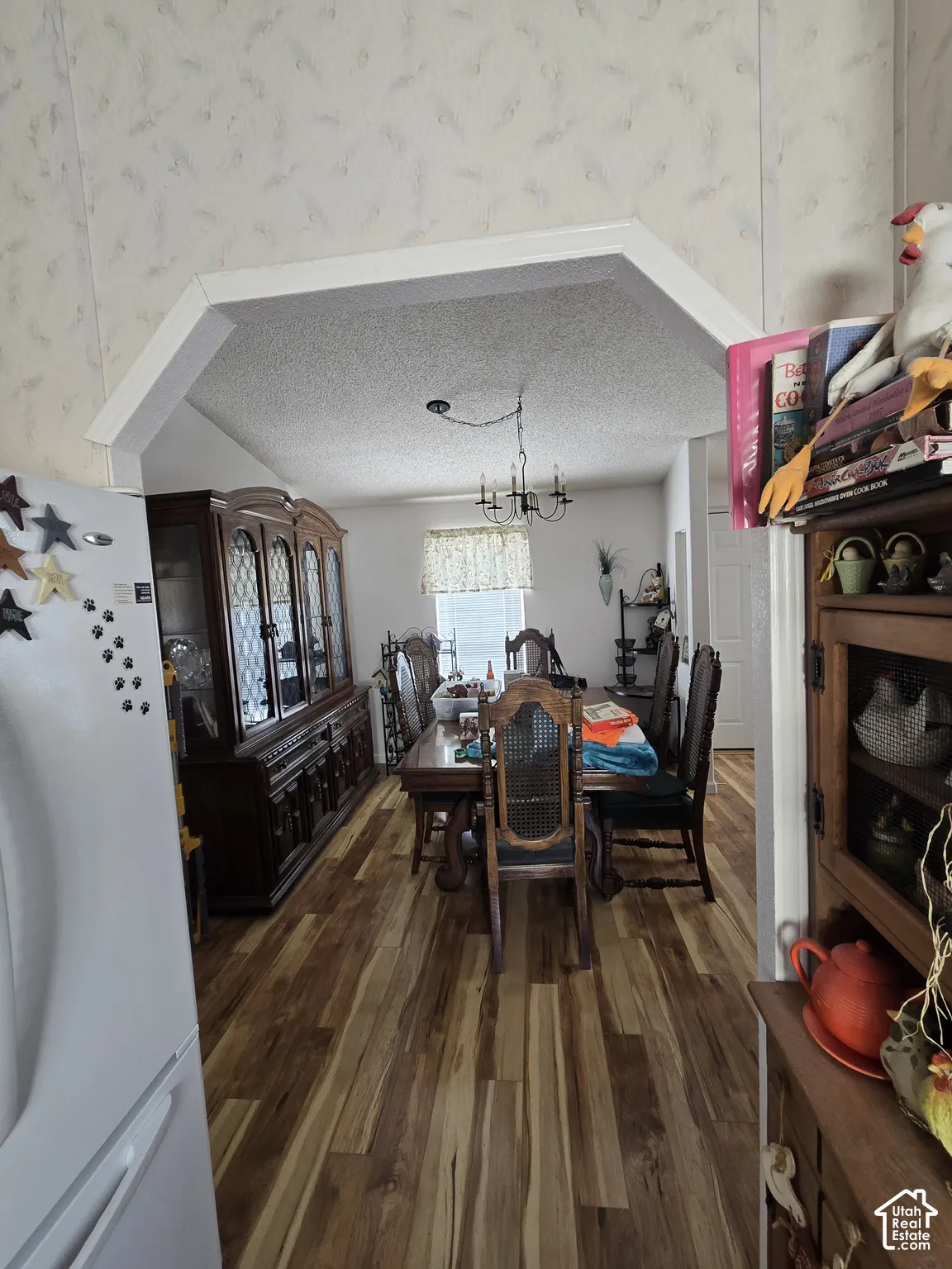 Wood-finish flooring throughout the dining area
