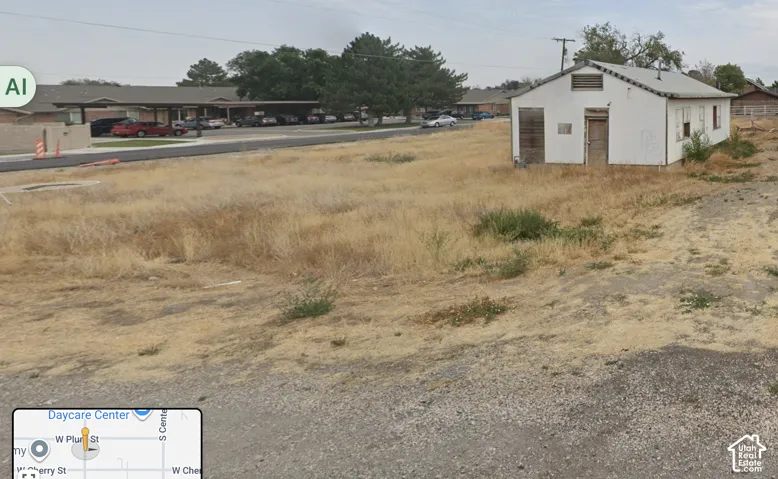 West facing side of building lot with structure