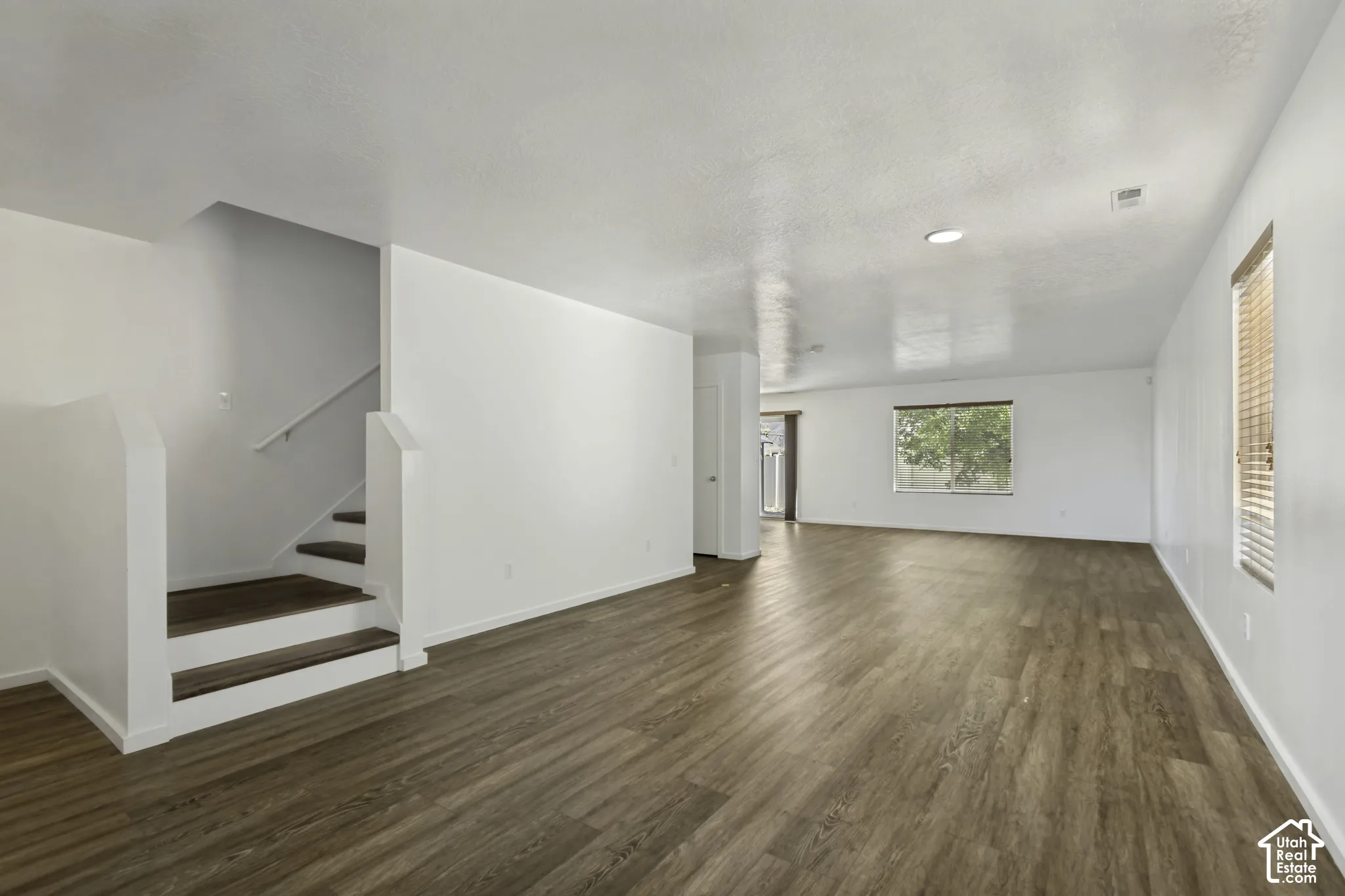 Wood-finish flooring throughout the main level
