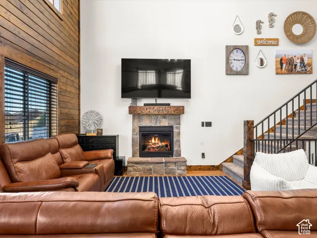 Stone fireplace with a wood mantel
