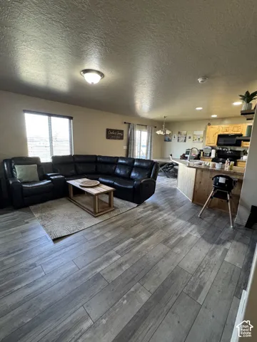 Wood-finish flooring throughout, offering a cohesive aesthetic
