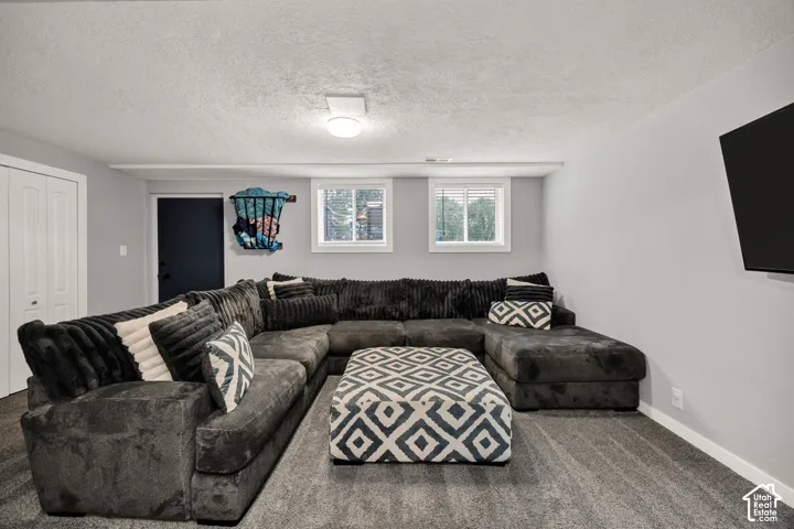 Recessed lighting and two windows with blinds