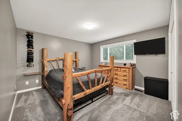 Gray wall paint, white trim, and light gray carpet