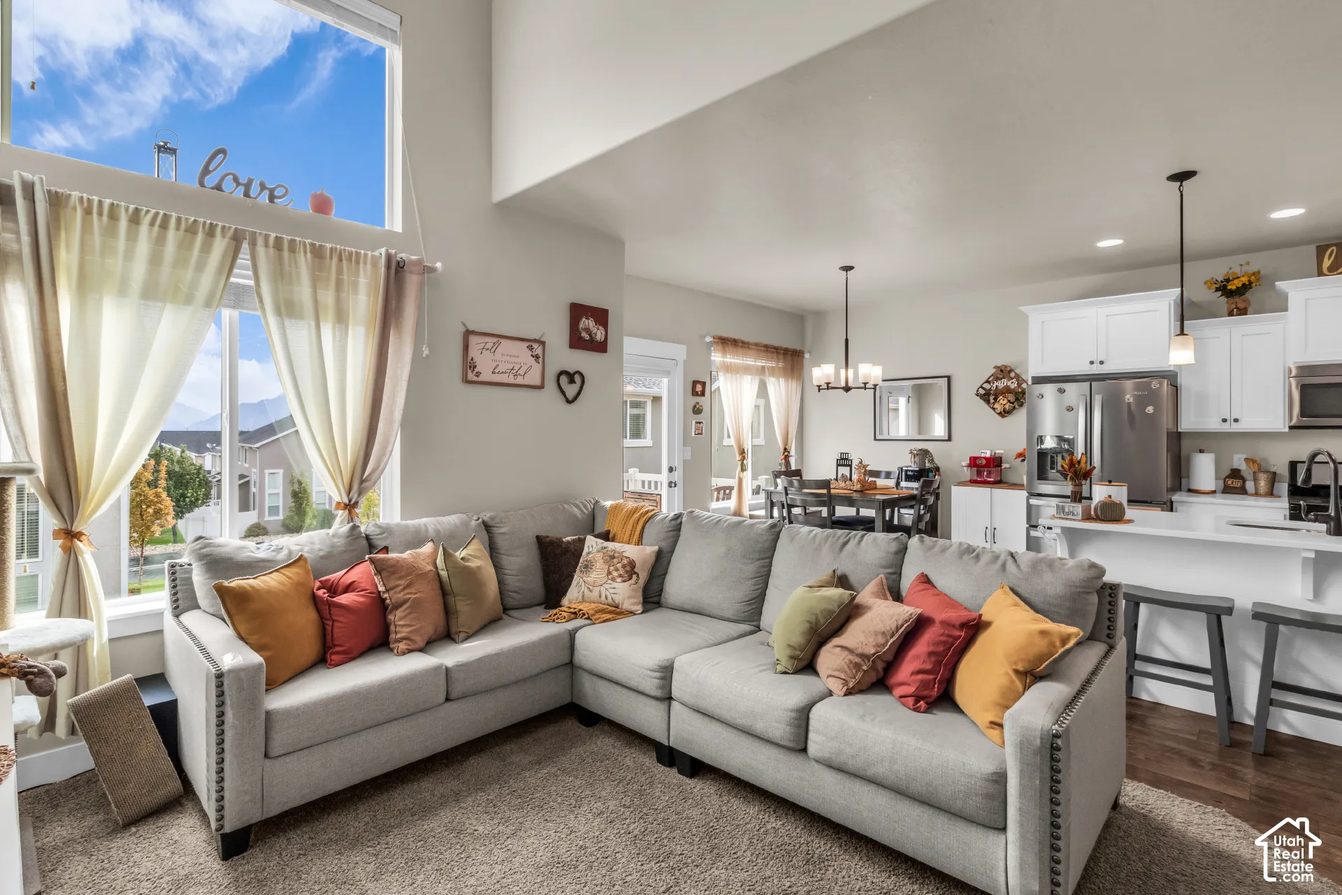 Soaring ceilings with upper transom windows