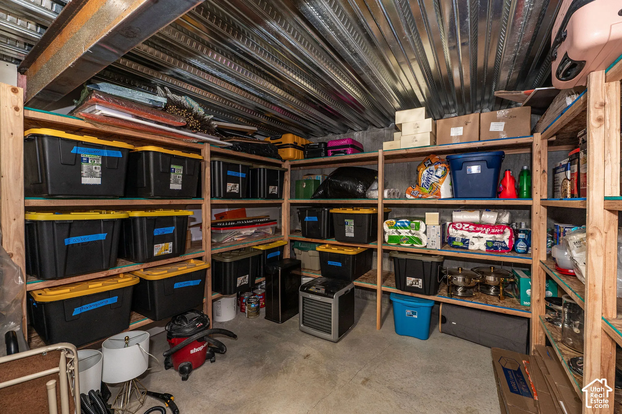 Extensive built-in wood shelving for organized storage