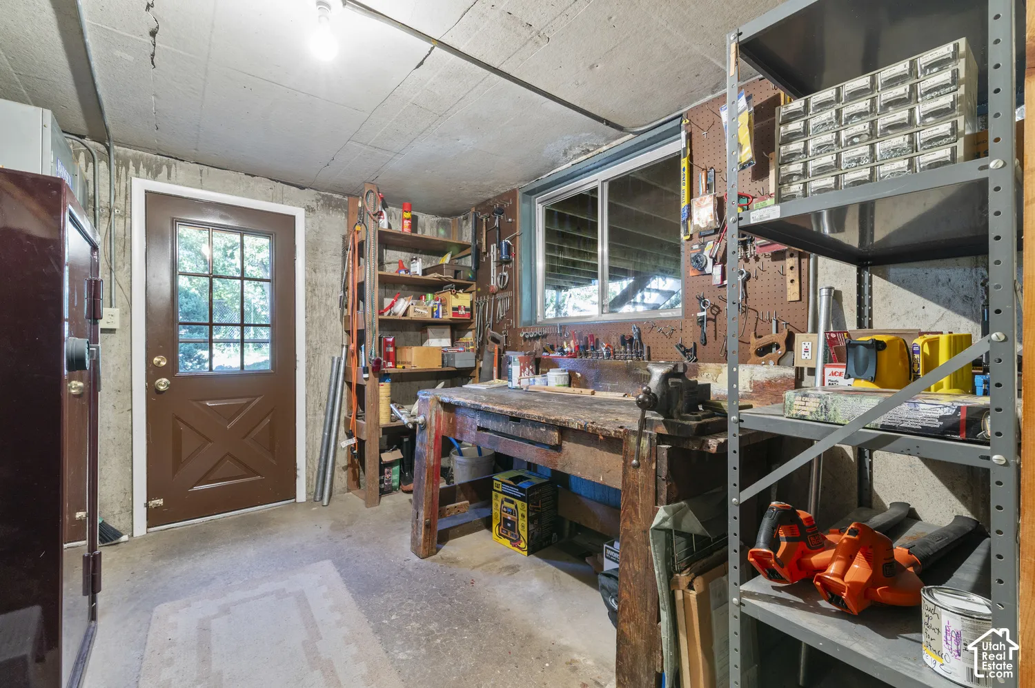 Concrete flooring and walls with overhead lighting