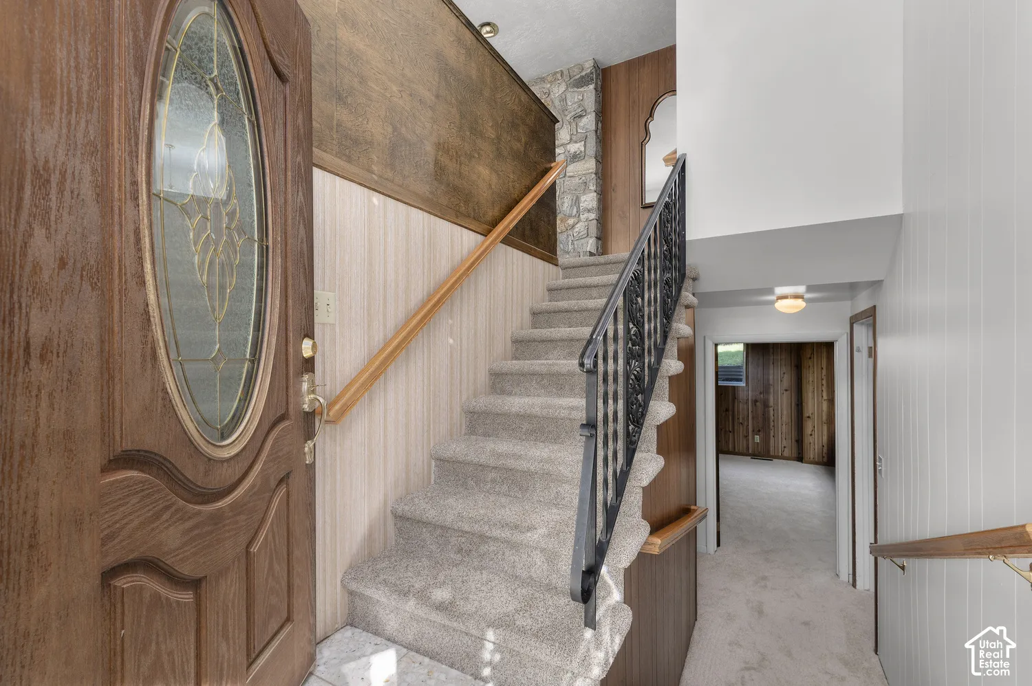 Wood entry door with decorative glass insert