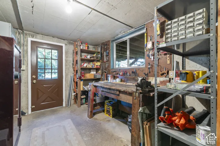 Concrete flooring and walls with overhead lighting