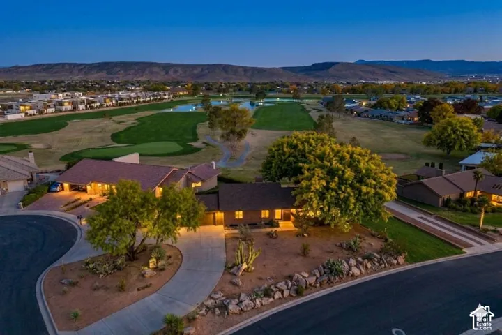 Expansive golf course frontage with mature landscaping