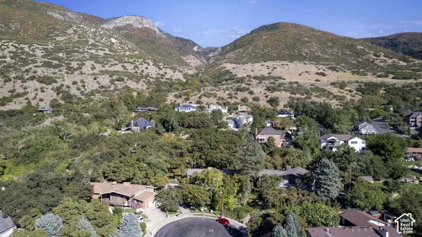 Residential community nestled within a mountainous landscape