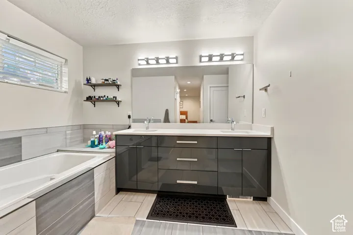Dual vanity with modern cabinetry and integrated sinks