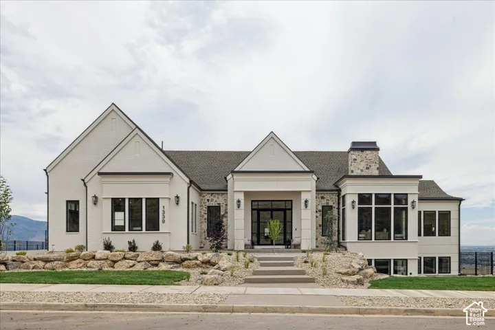 White brick exterior with stone accents