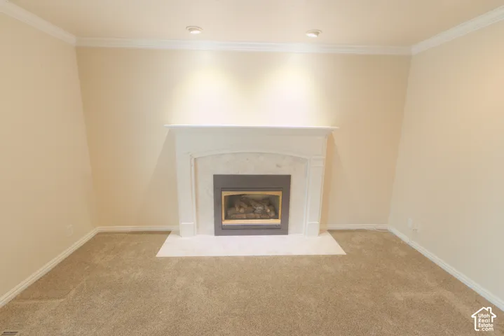 Fireplace with a white mantel and hearth