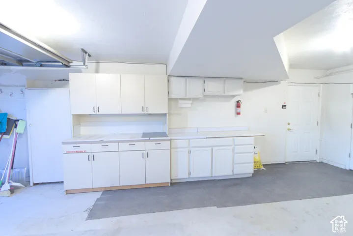 White cabinetry with light countertops