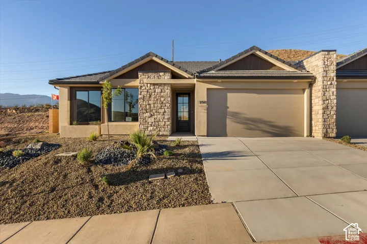 Stone veneer accents and stucco exterior