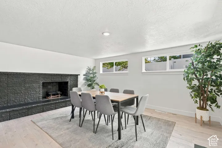 2nd wood burning fireplace makes this dining room cozy and inviting.
