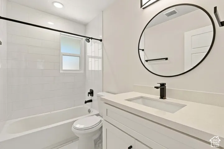 Beautiful & stylish shared bathroom on main floor with black matte accessories