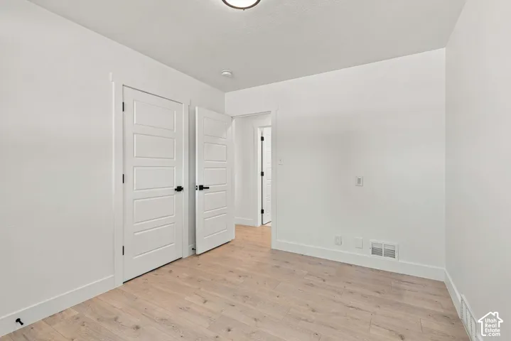 1st bedroom on main floor, across of shared bathroom.
