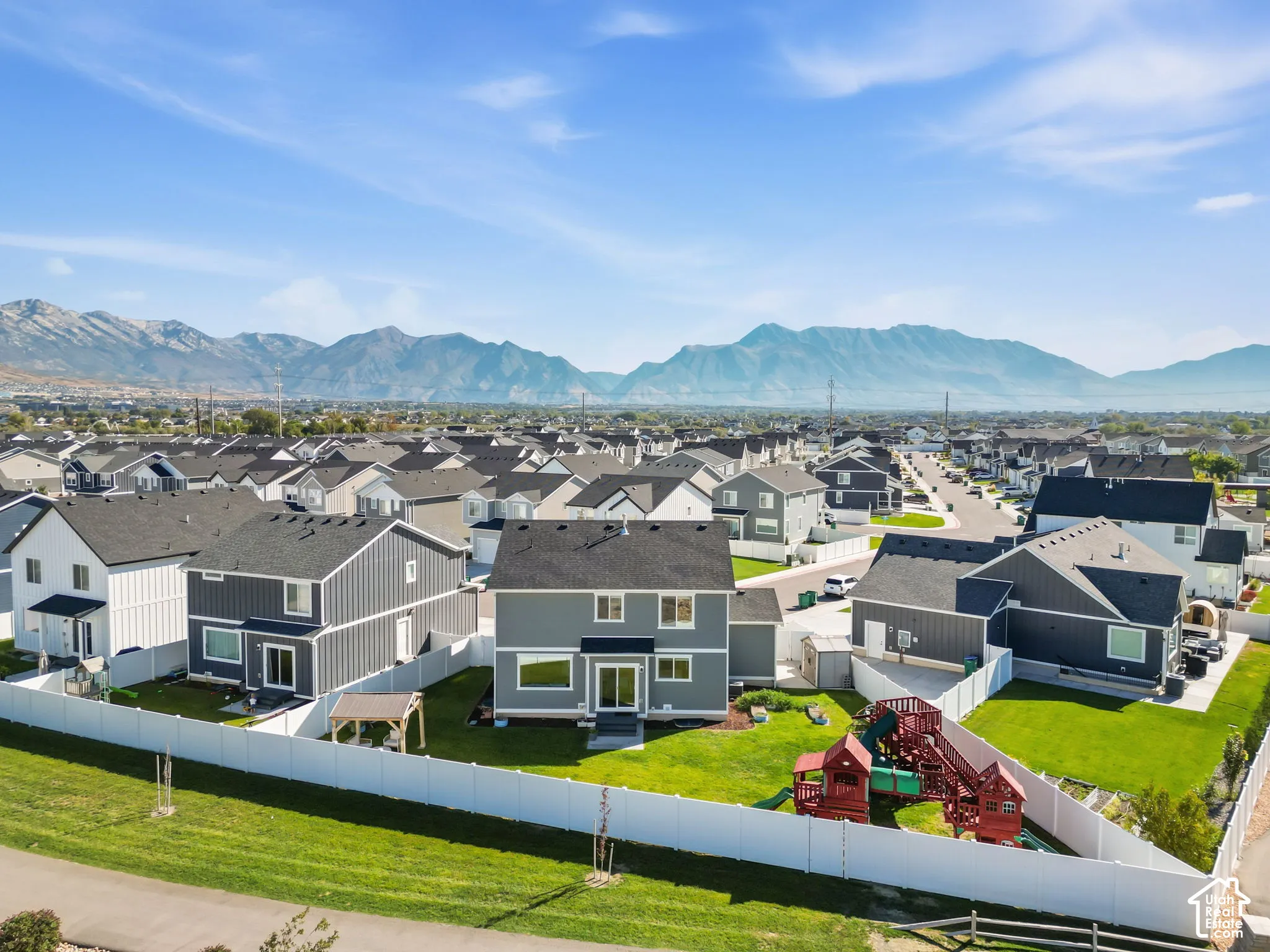 Neighborhood setting with mountain backdrop