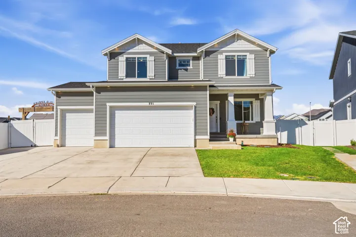 Two-story residence with gray horizontal siding and white trim
