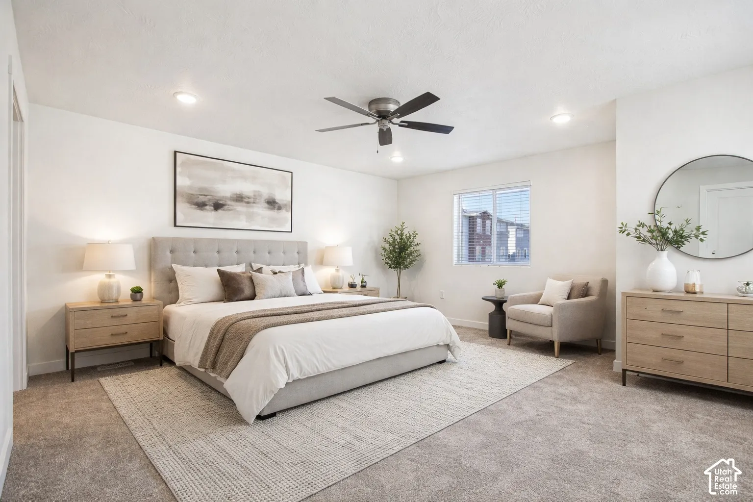 Recessed lighting, ceiling fan, and carpeted flooring