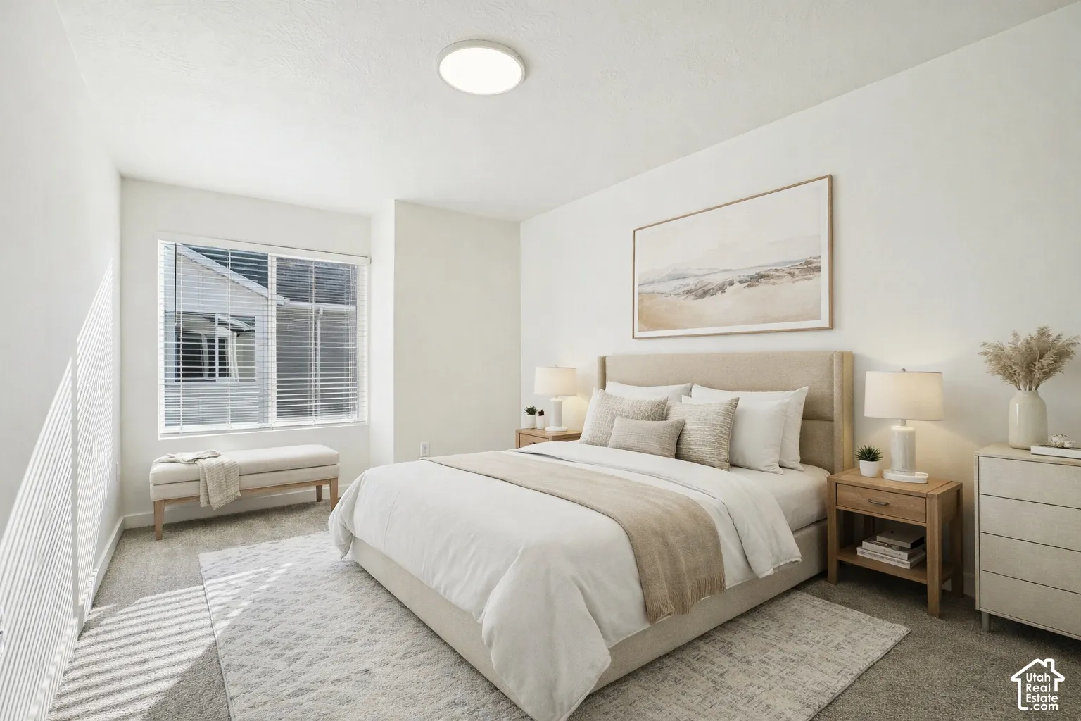 Recessed lighting, large window with blinds, neutral wall paint, and carpeted flooring