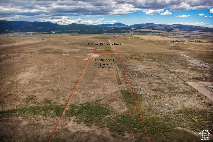 Expansive acreage featuring 28.183 acres and 7.85 acre-feet of water rights