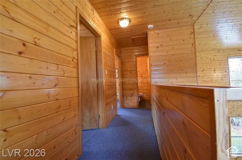 Wood-paneled walls and ceiling