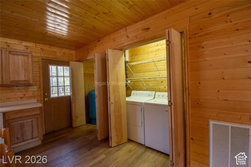 Wood-finish flooring, wood plank walls, and wood plank ceiling
