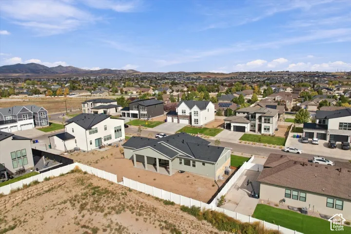 Contemporary residential development featuring a mountain backdrop