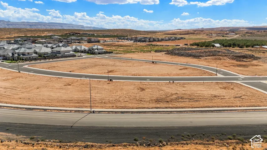 Expansive undeveloped lot with paved road frontage