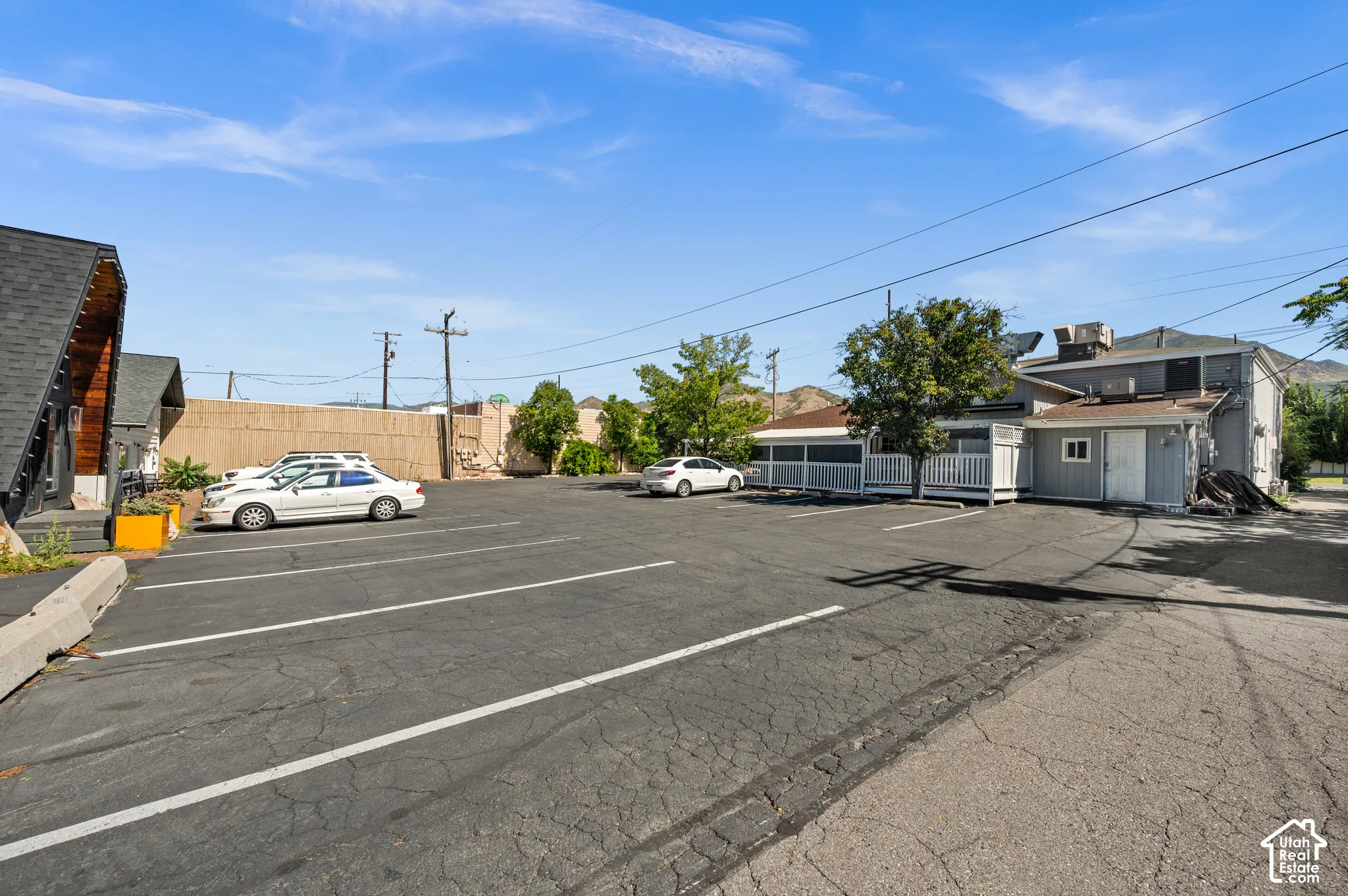 Expansive asphalt parking lot with marked spaces