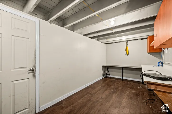 Wood-finish flooring with exposed ceiling joists