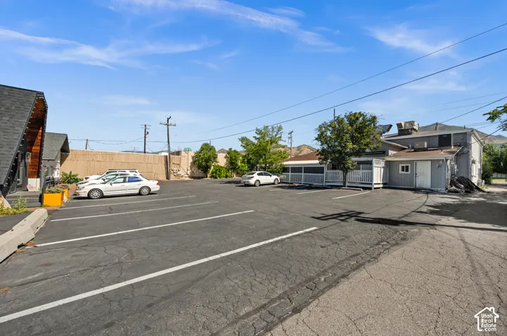 Expansive asphalt parking lot with marked spaces