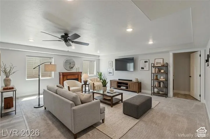 Recessed lighting and ceiling fan overhead
