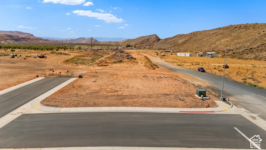 Paved road with curbs and sidewalks