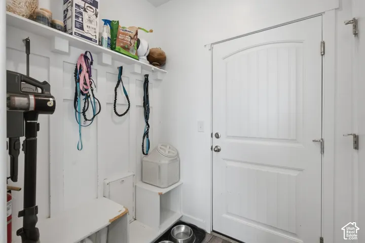 Custom built-in storage bench with coat hooks