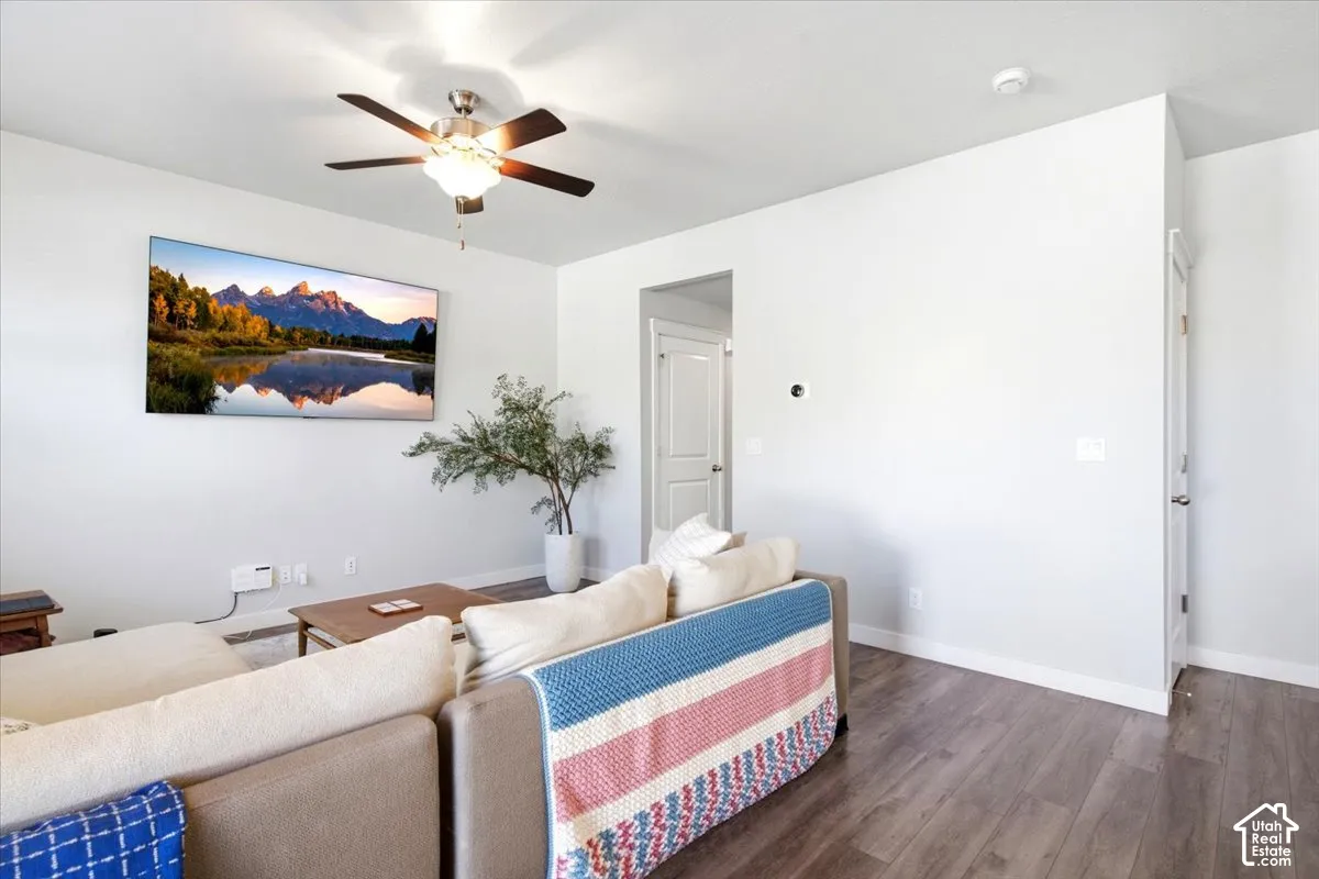 Recessed lighting, ceiling fan with integrated lighting, wood-finish flooring, and white interior doors