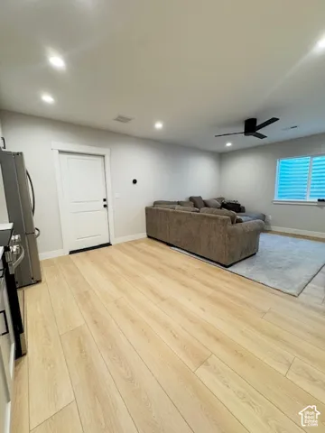 Recessed lighting, wood-finish flooring, ceiling fan, and stainless steel appliances