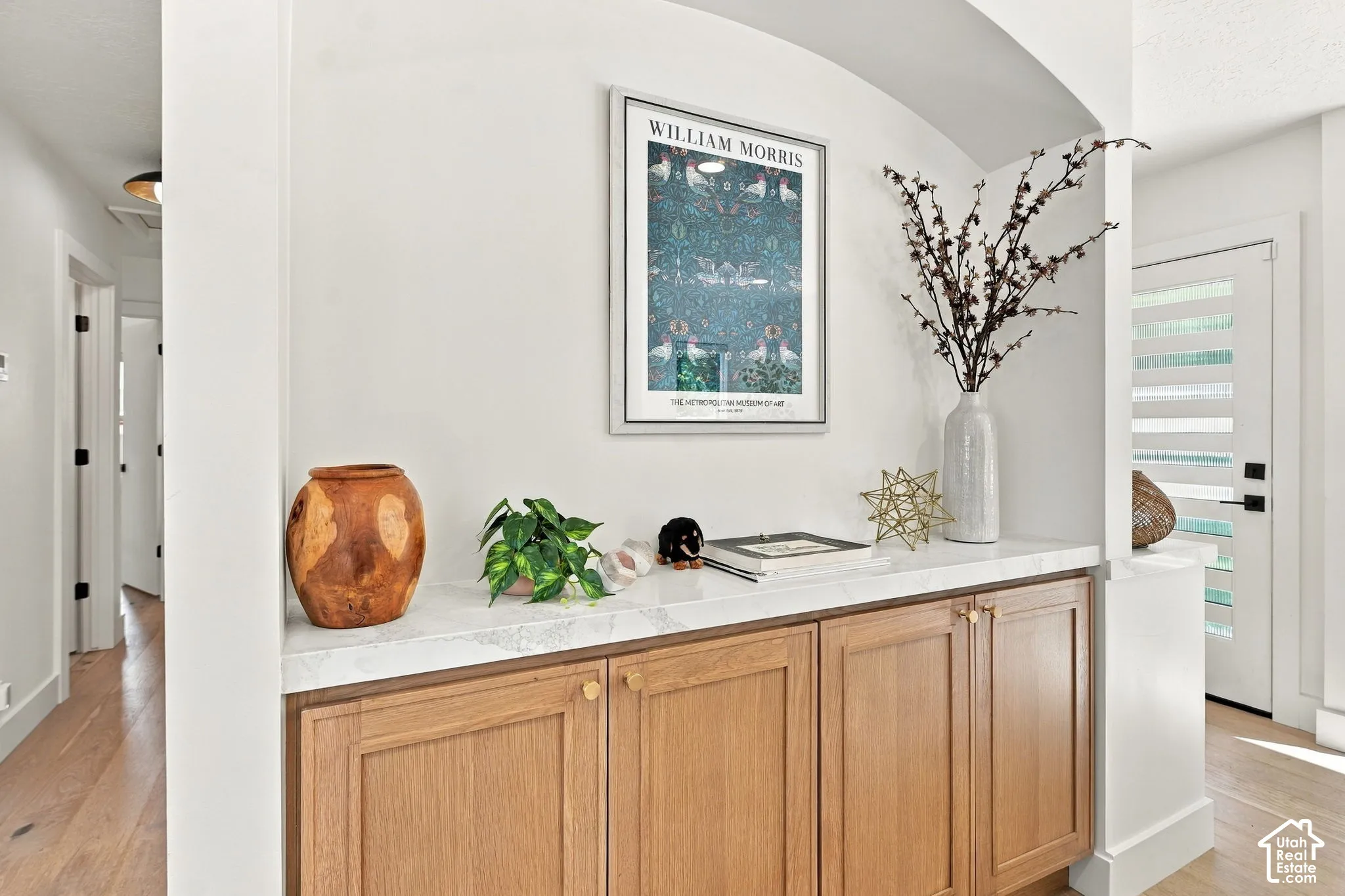 Built-in wood-finish cabinetry with a light-toned countertop