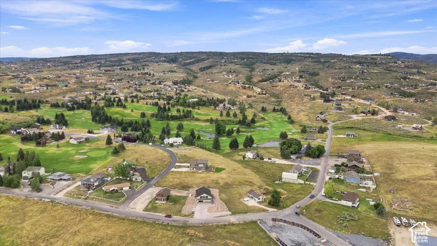 Expansive residential development featuring varied architectural styles and natural landscaping