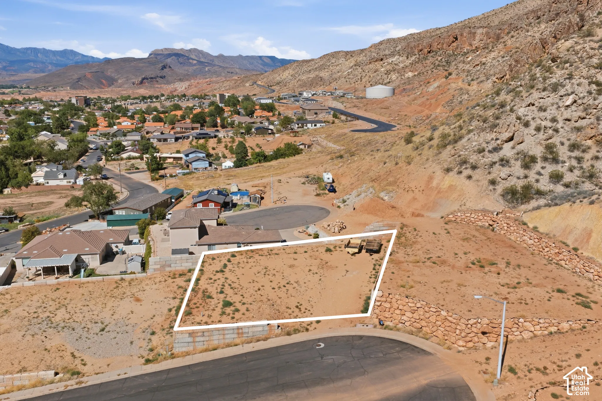 Expansive undeveloped lot with a mountainous backdrop