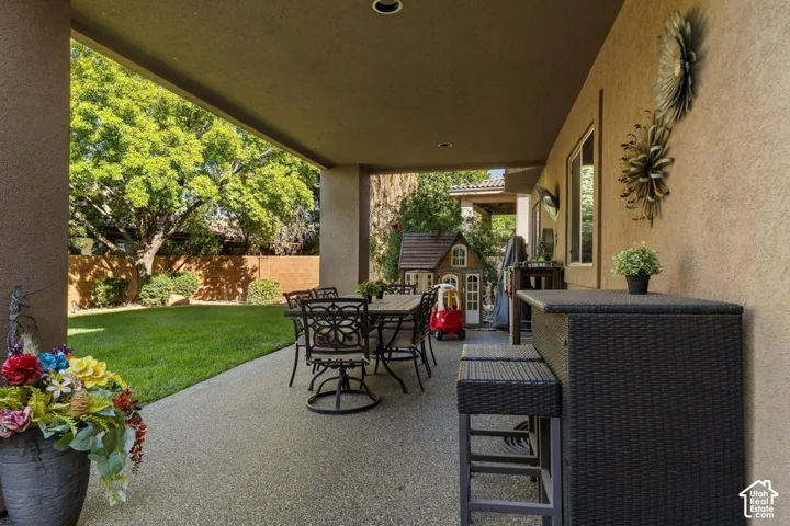 Covered patio with a textured concrete surface