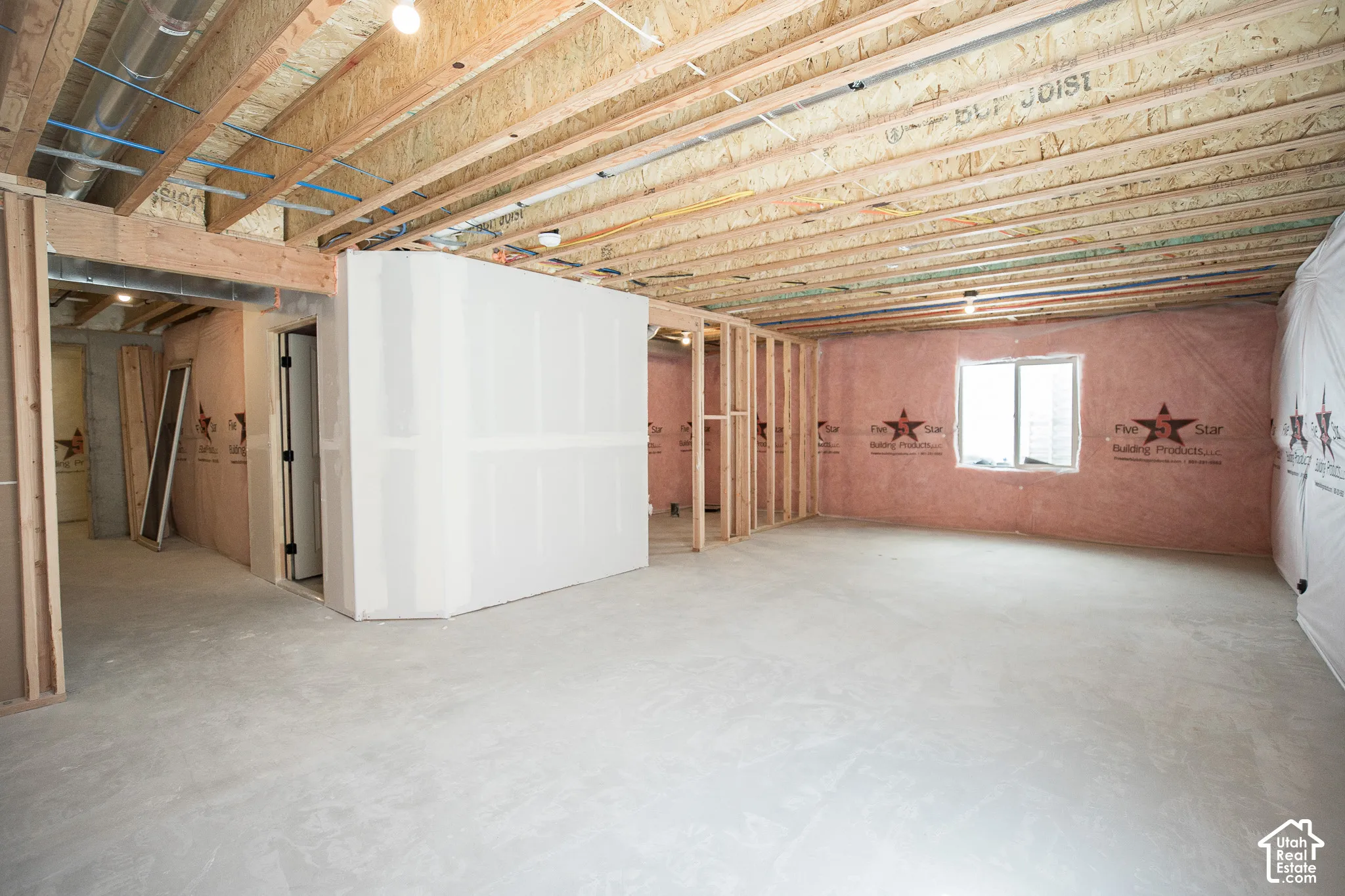 Unfinished basement with potential for large family/game room, full bathroom and one bedroom.